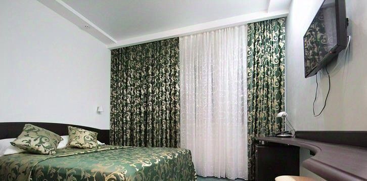 комната г Волгоград р-н Центральный ул Краснознаменская 25 фото 1