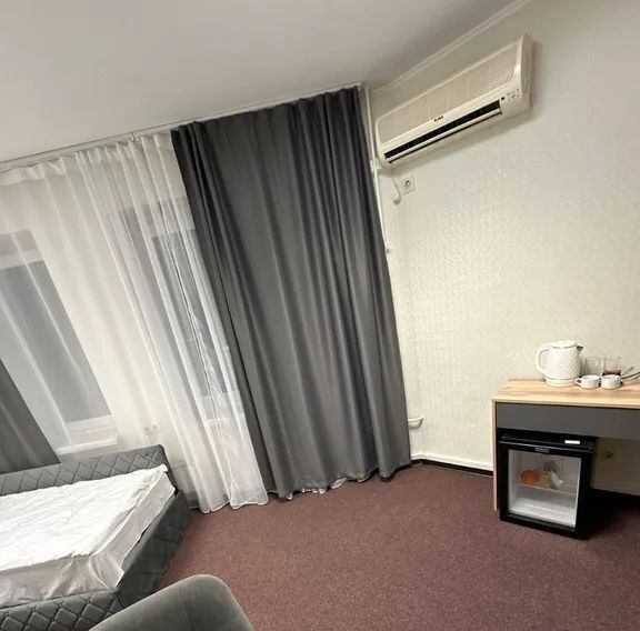 комната г Волгоград р-н Центральный ул Коммунистическая 40 фото 4
