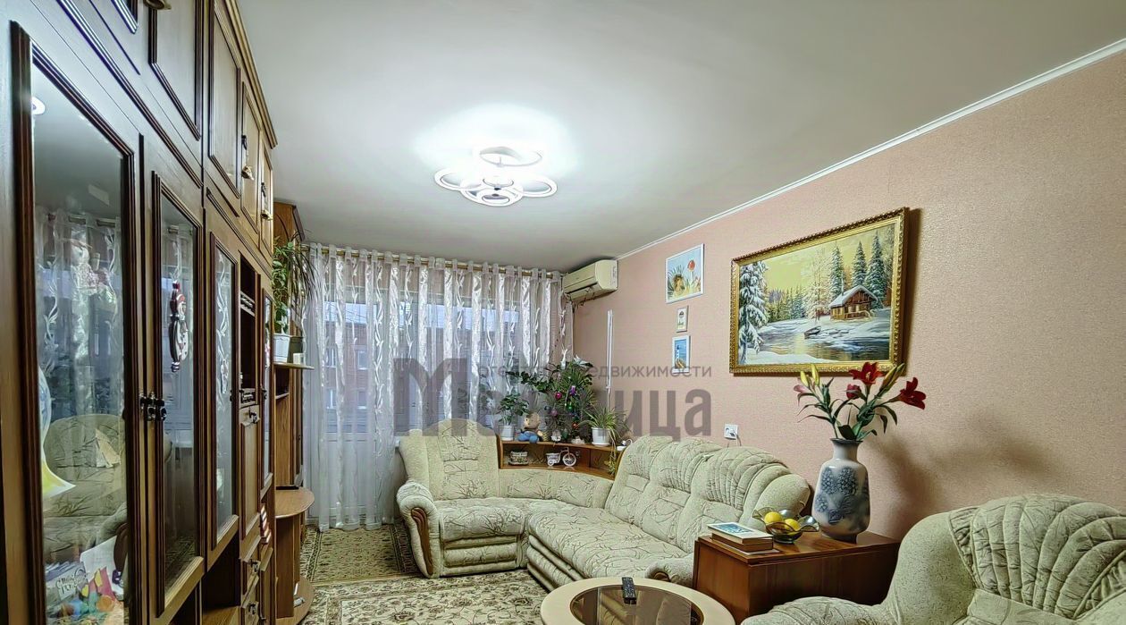 квартира г Волгоград р-н Краснооктябрьский ул им. Хользунова 40 фото 1