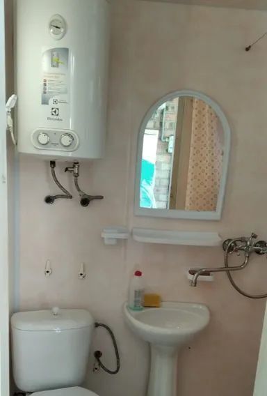 комната р-н Ейский г Ейск ул Рабочая 2б фото 3