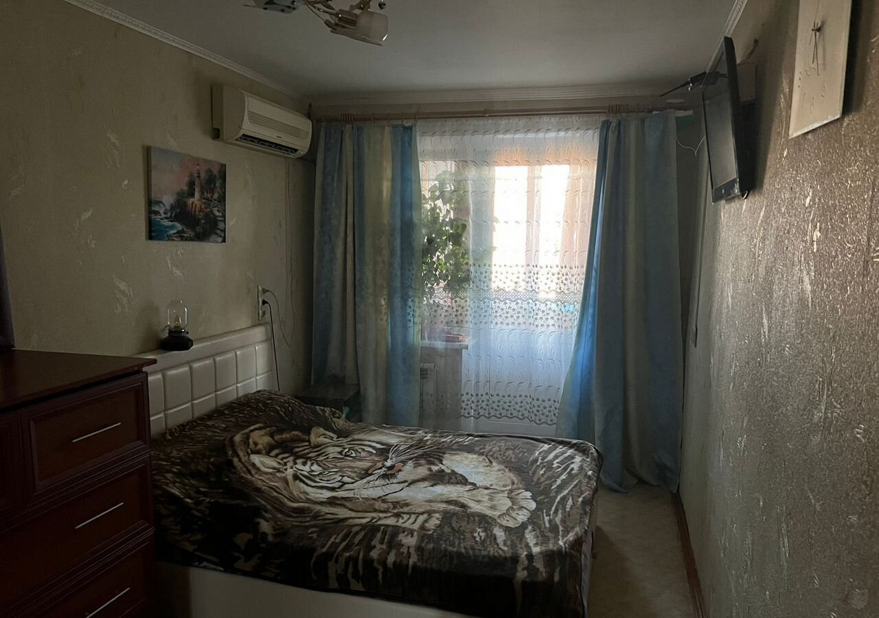 квартира г Волгоград р-н Дзержинский ул Рионская 11 фото 2
