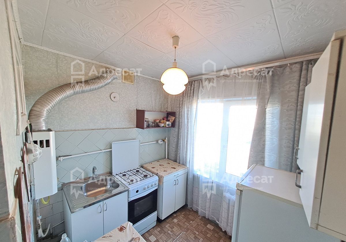 квартира г Волгоград р-н Дзержинский ул Краснополянская 14 фото 1