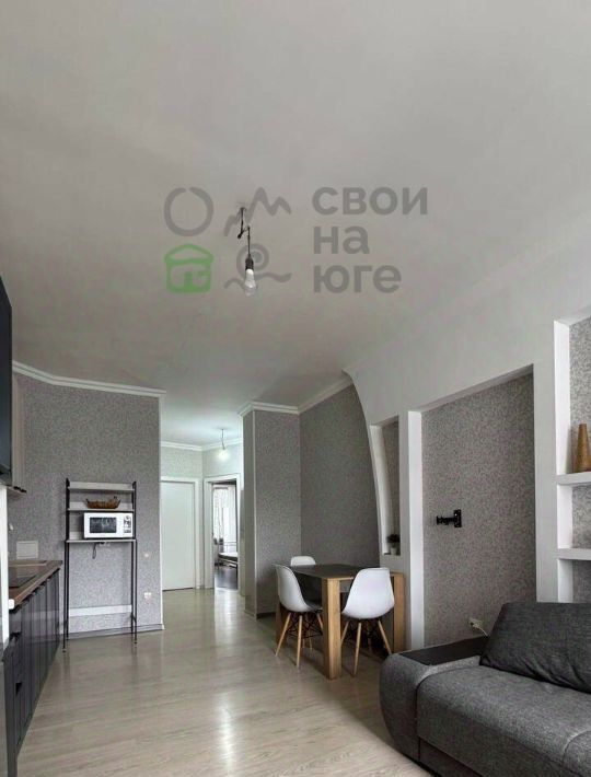 квартира г Краснодар р-н Прикубанский мкр им Петра Метальникова ул Защитников Отечества фото 1