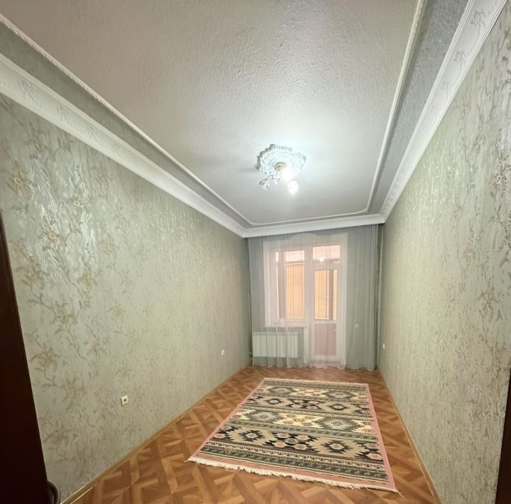 квартира г Махачкала р-н Кировский ул Хутинаева 45 фото 35