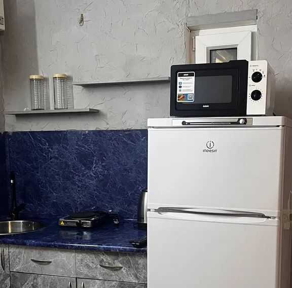 комната р-н Ейский г Ейск ул Рабочая 2б фото 4