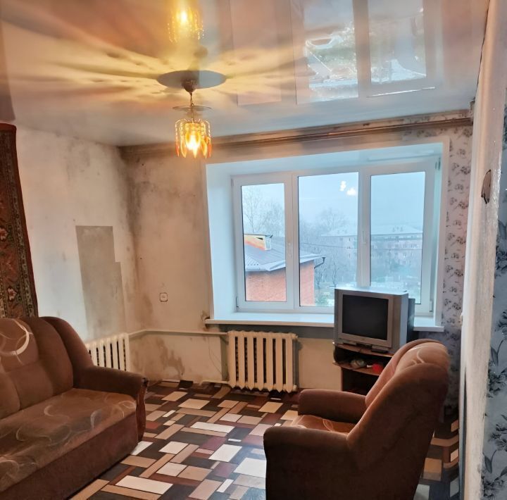 комната г Прокопьевск р-н Центральный ул Кучина 24а фото 1