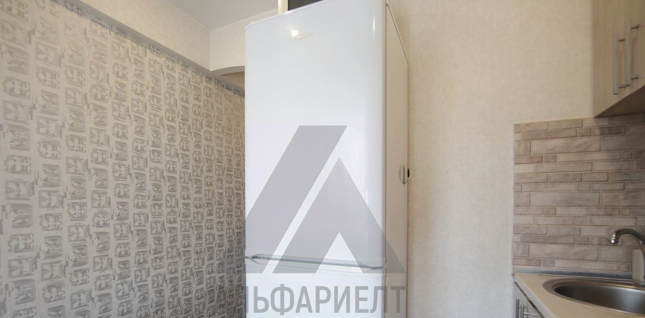 квартира г Омск р-н Октябрьский ул 50-летия ВЛКСМ 14 фото 2